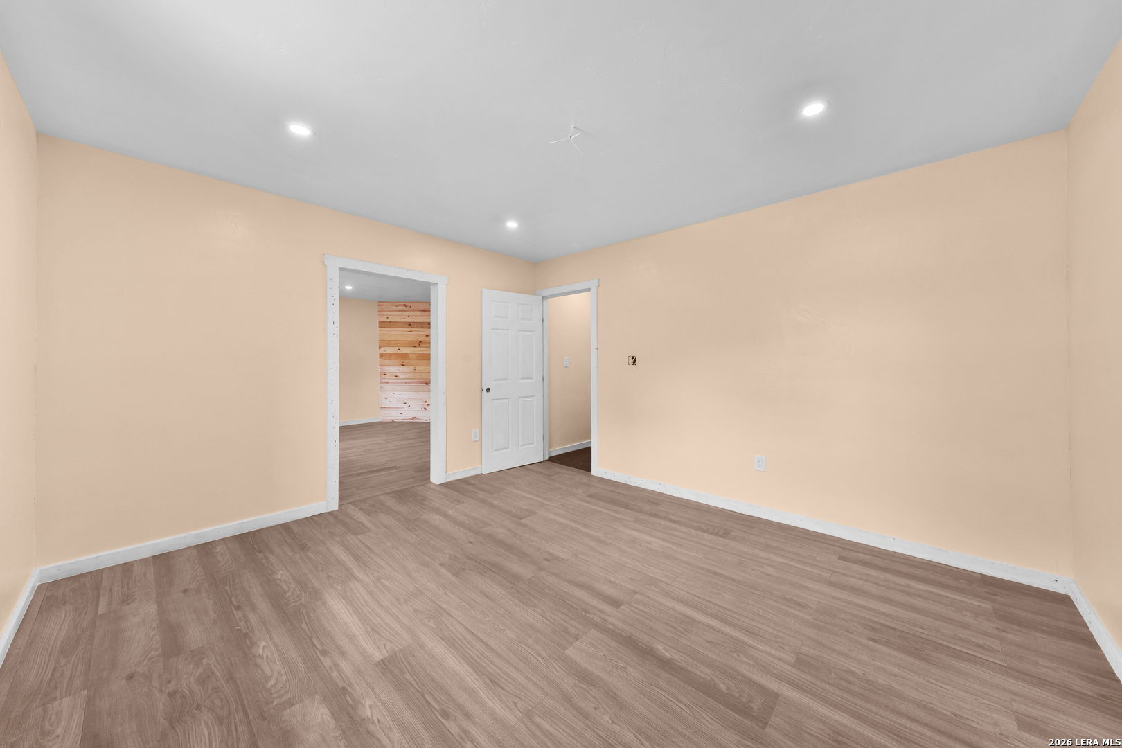 122 Brink Center Point, TX 78010 - Photo 25 of 40 a view of an empty room with wooden floor