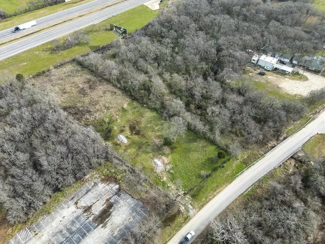 a view of a forest from a balcony
