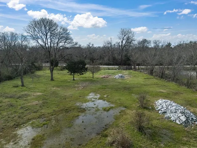 a view of a golf course with a yard