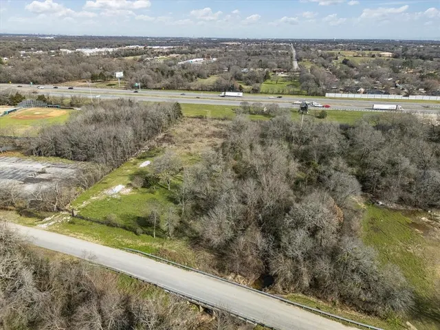 a view of a lake with a city
