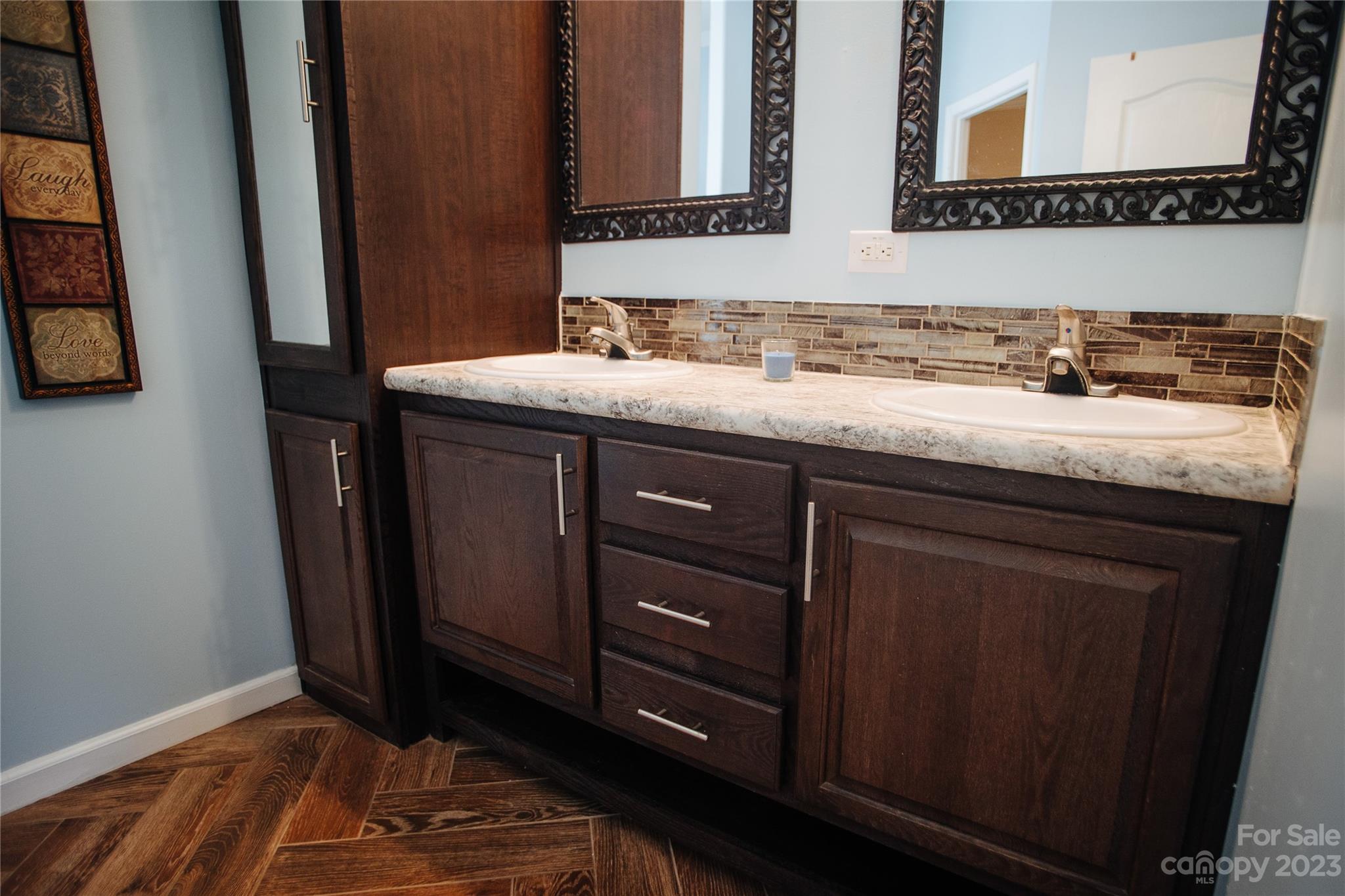 210 Mooseheart Ridge Marion, NC 28752 - Photo 18 of 37 a bathroom with a sink and a mirror