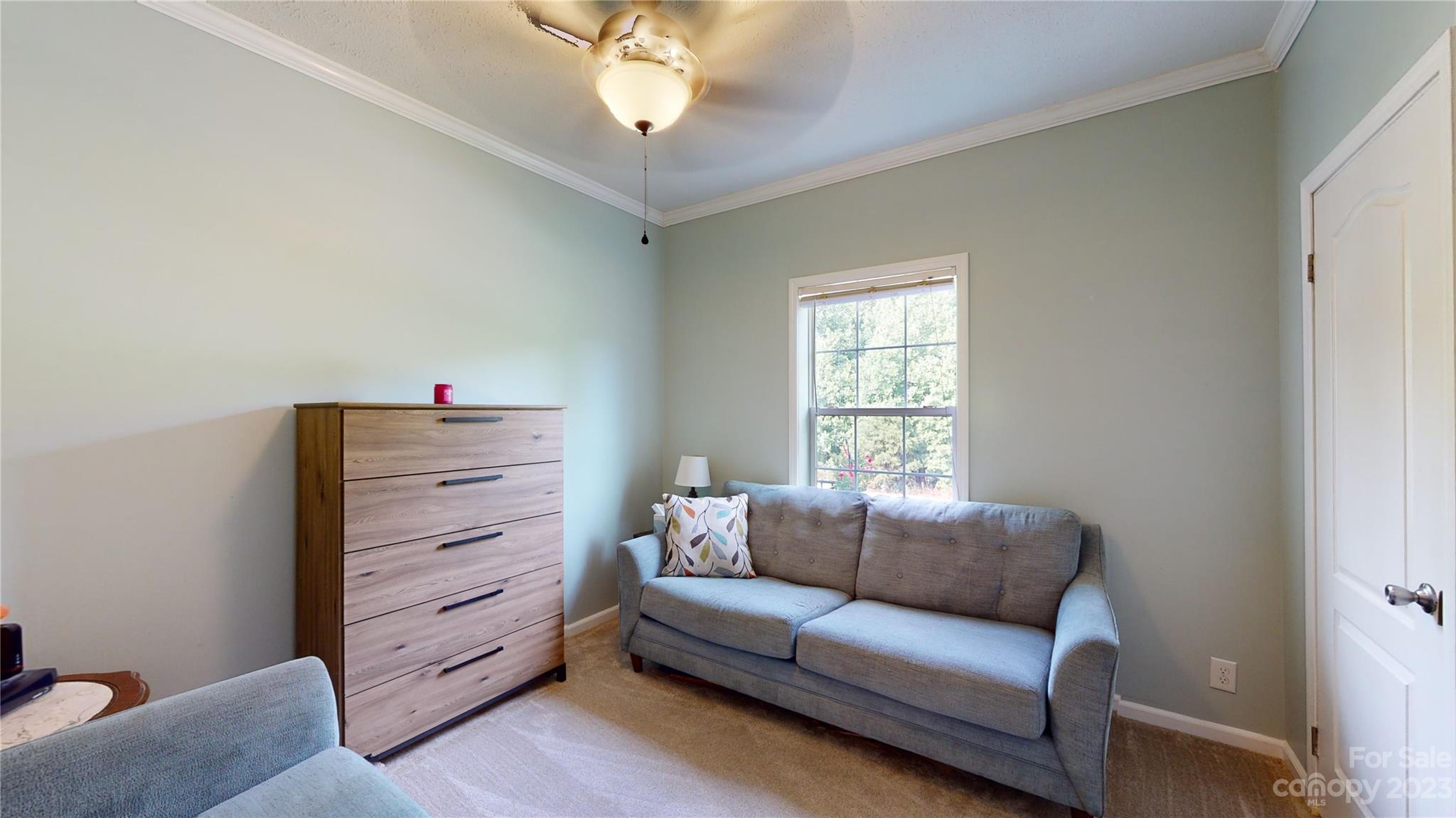 210 Mooseheart Ridge Marion, NC 28752 - Photo 24 of 37 a living room with furniture and a window