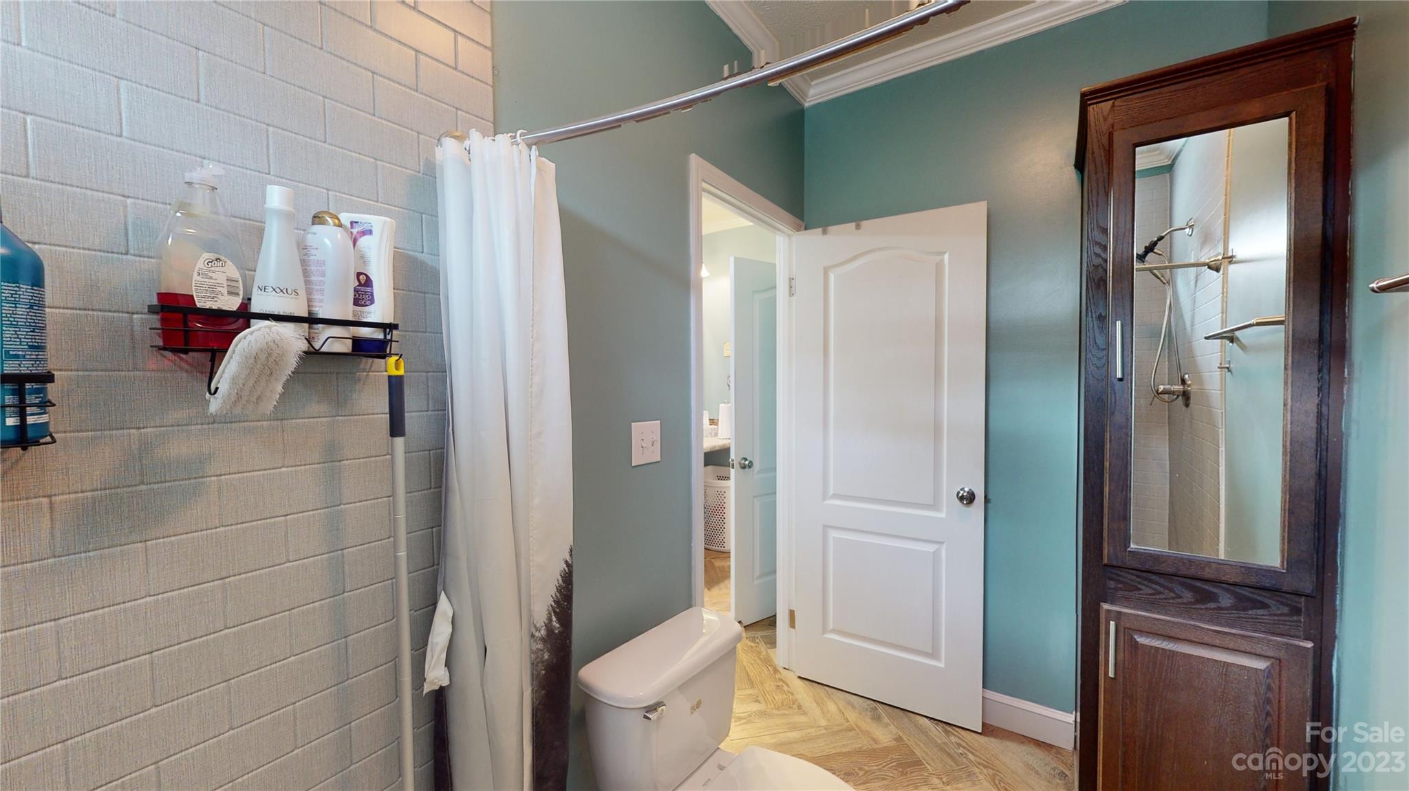 210 Mooseheart Ridge Marion, NC 28752 - Photo 26 of 37 a bathroom with a shower and a toilet