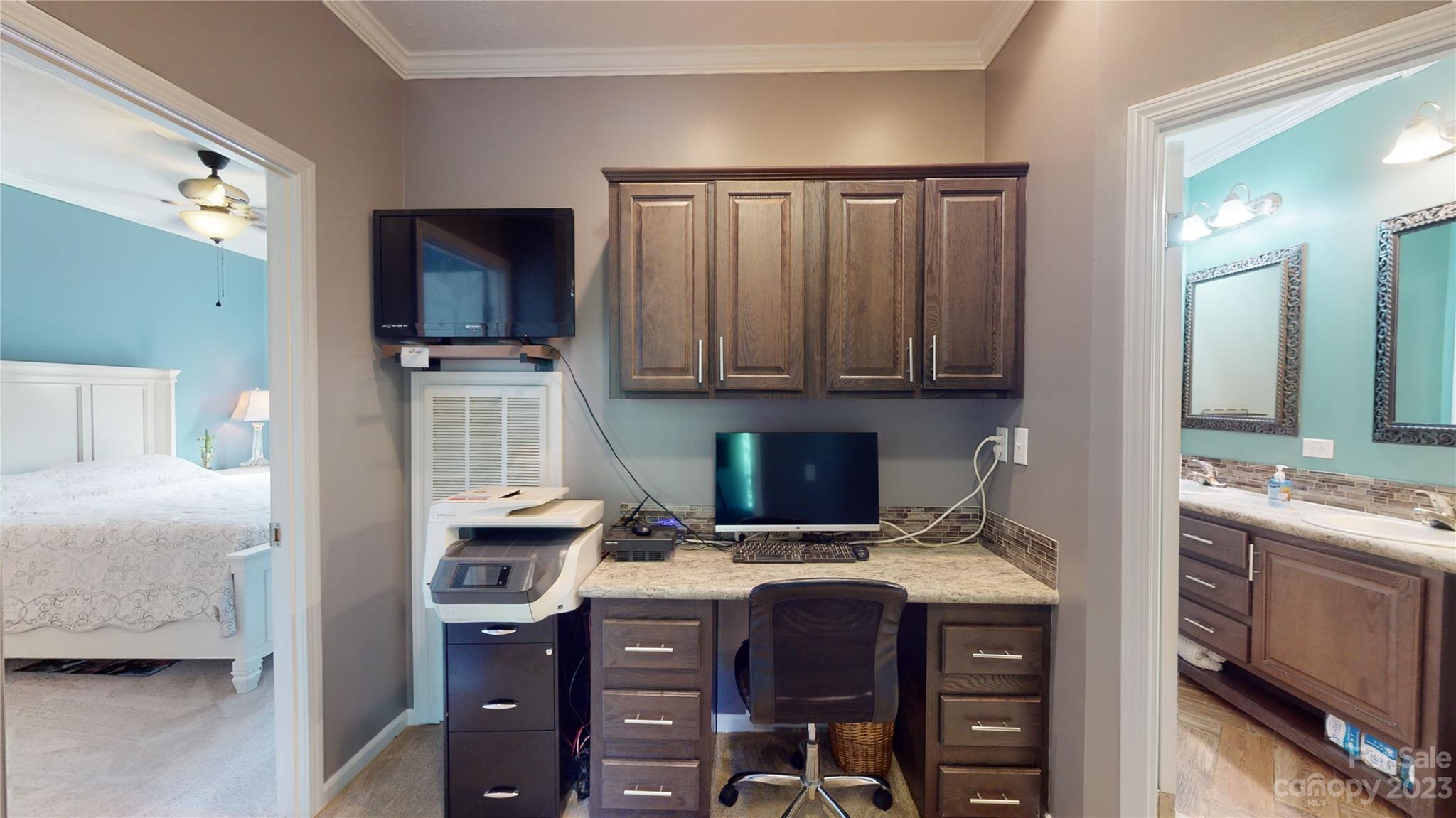 210 Mooseheart Ridge Marion, NC 28752 - Photo 27 of 37 a kitchen with a sink cabinets and wooden floor