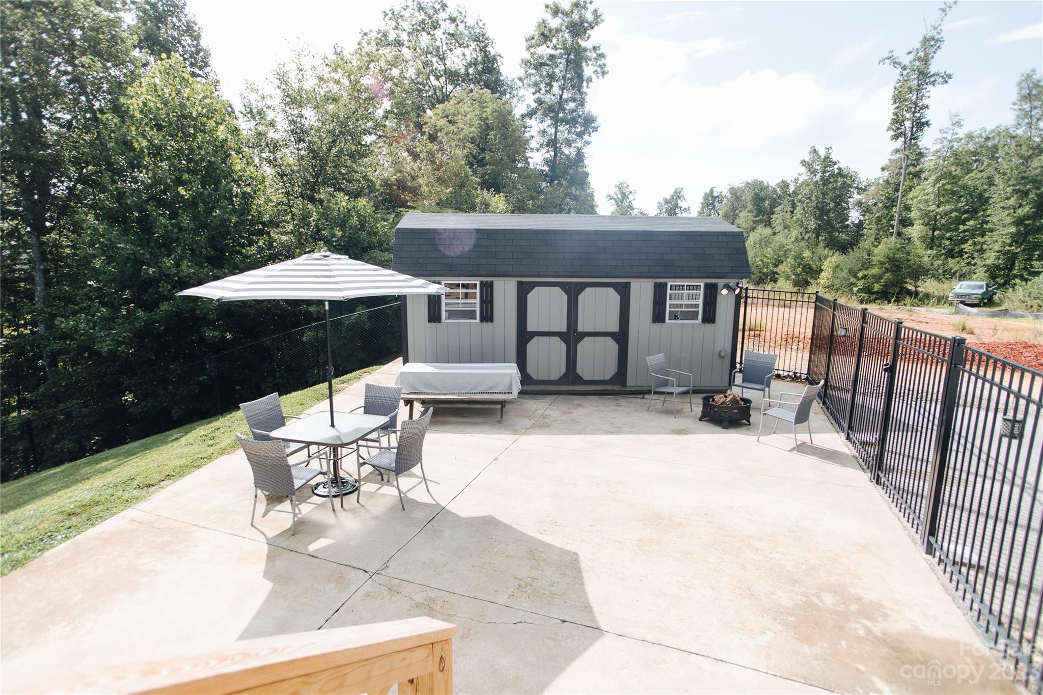 210 Mooseheart Ridge Marion, NC 28752 - Photo 33 of 37 a view of backyard with outdoor seating and trees