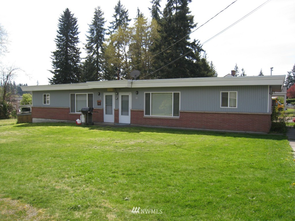 6825 Cady Road Everett, WA 98203 - Photo 3 of 3 a front view of house with yard and green space