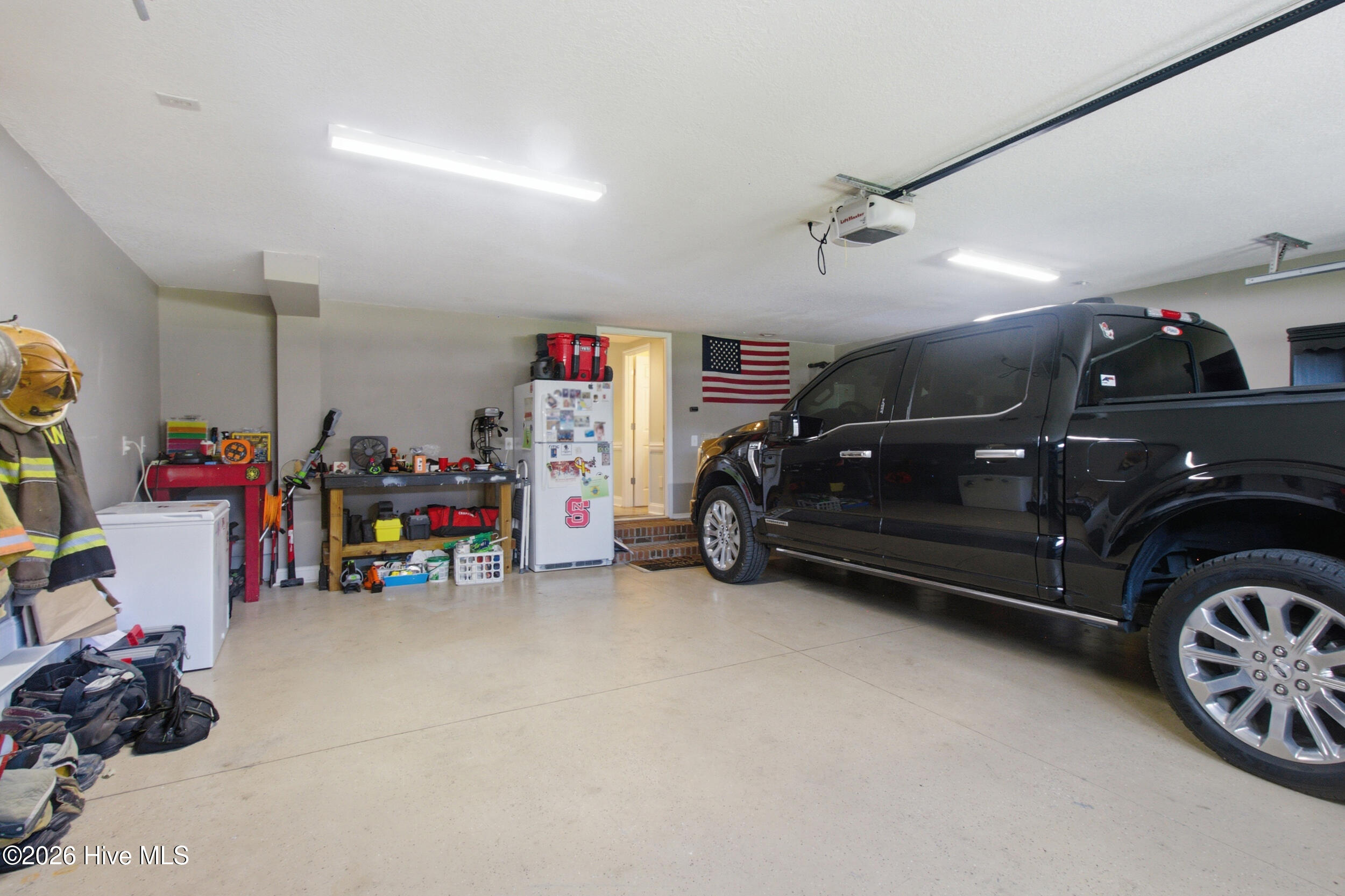 100 Sand Run Road Havelock, NC 28532 - Photo 31 of 39 Larger garage Fits F150 and Expedition with room for storage