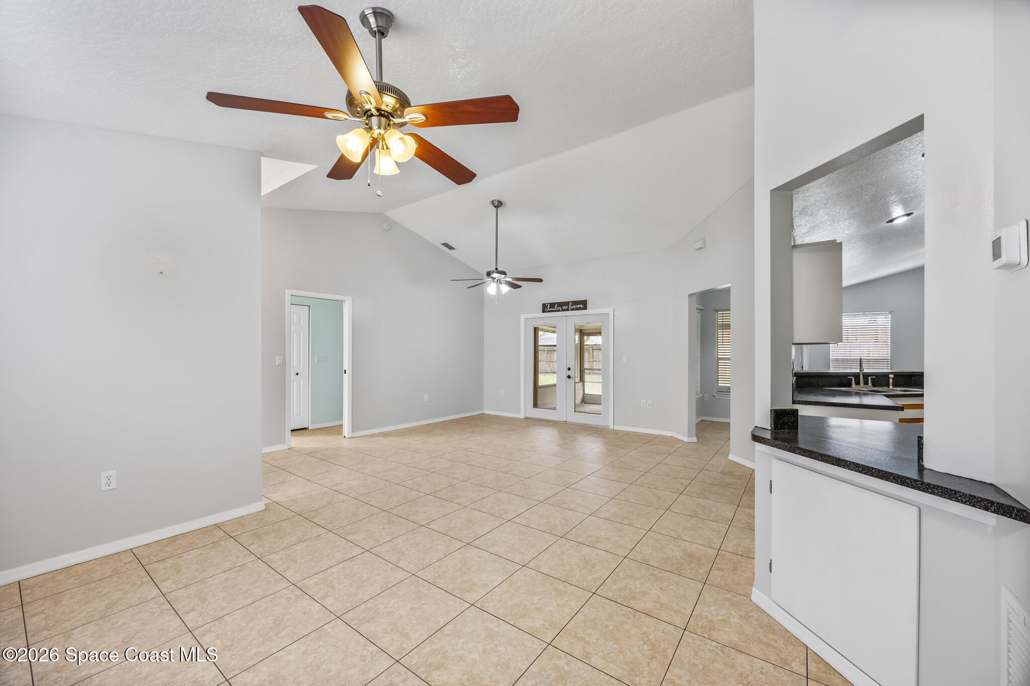 4600 Comfort Street Cocoa, FL 32927 - Photo 11 of 29 a view of a kitchen with a sink and a stove top oven