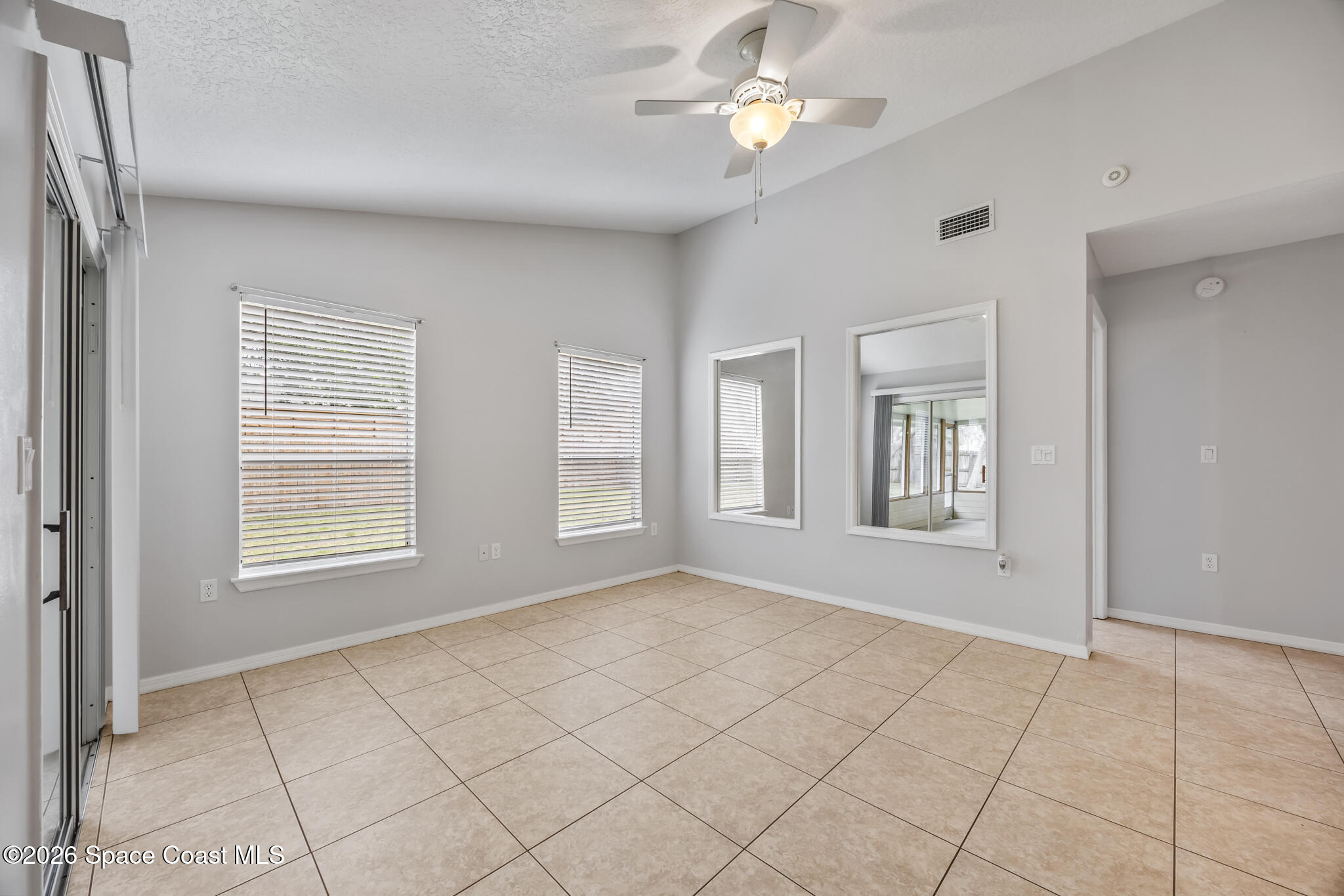 4600 Comfort Street Cocoa, FL 32927 - Photo 16 of 29 a view of an empty room with a window