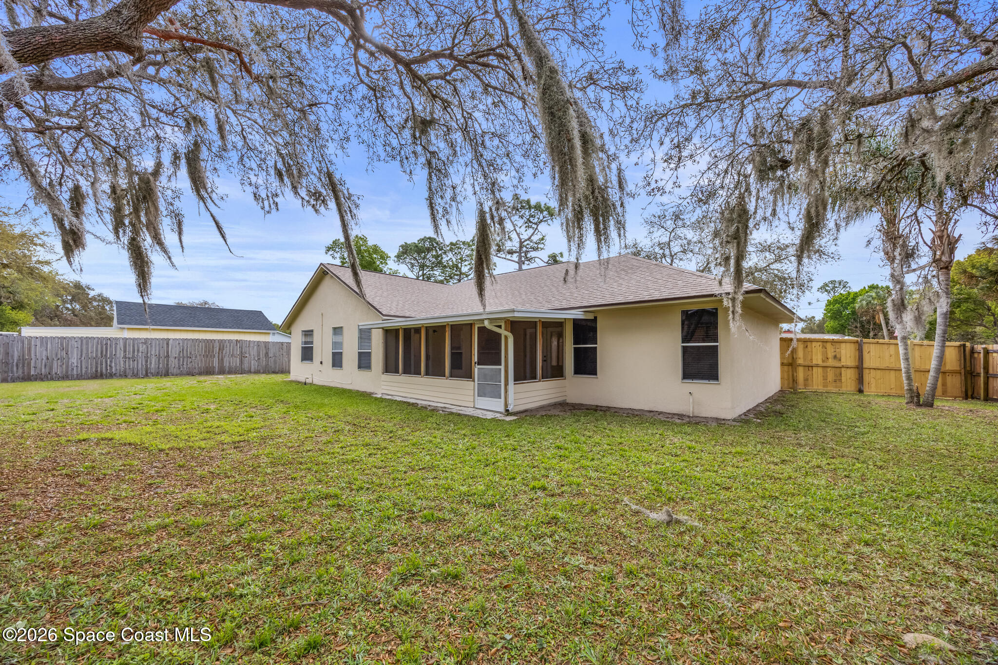 4600 Comfort Street Cocoa, FL 32927 - Photo 26 of 29 a view of a house with a yard