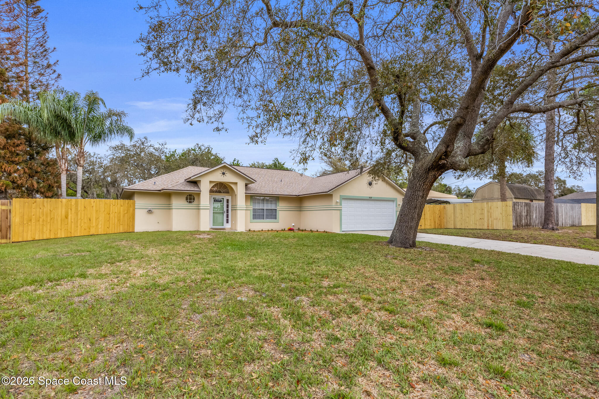 4600 Comfort Street Cocoa, FL 32927 - Photo 29 of 29 a front view of a house with a yard