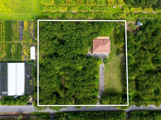 a spacious bathroom with a double vanity sink toilet and shower