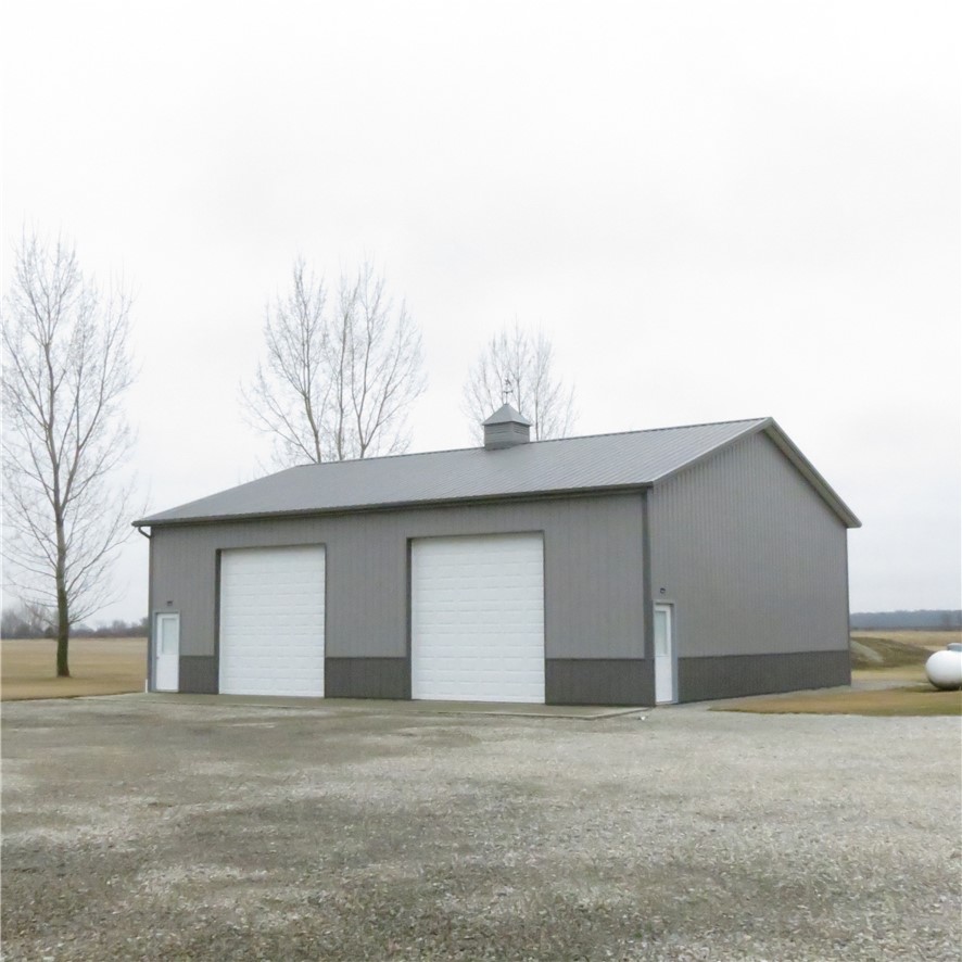 21242 Dingman-Slagle Road Pemberton, OH 45353 - Photo 4 of 33 This expansive garage building offers generous space for vehicles and storage.