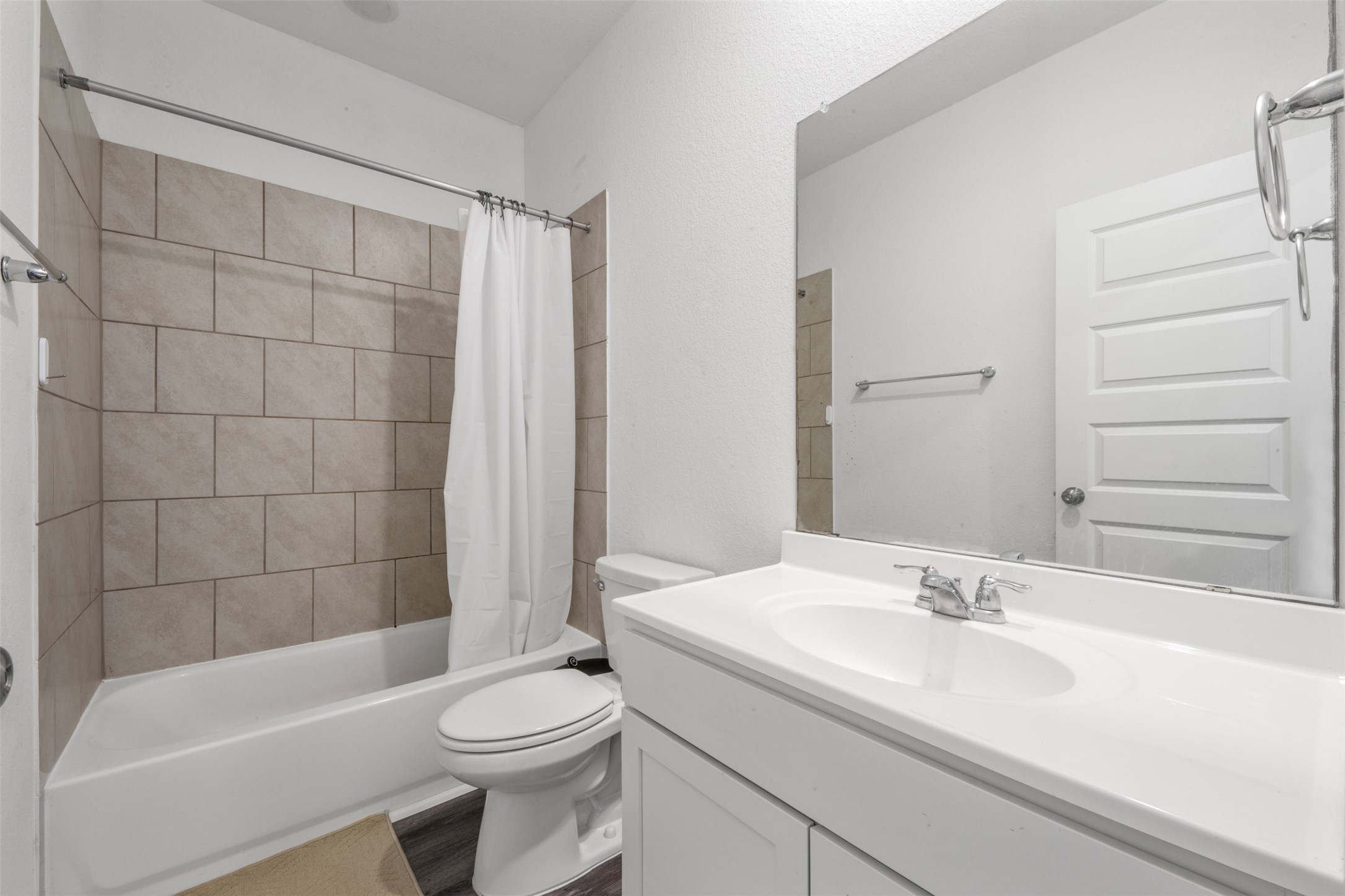 21214 George Vancouver Court Porter, TX 77365 - Photo 18 of 33 a bathroom with a sink a toilet and shower