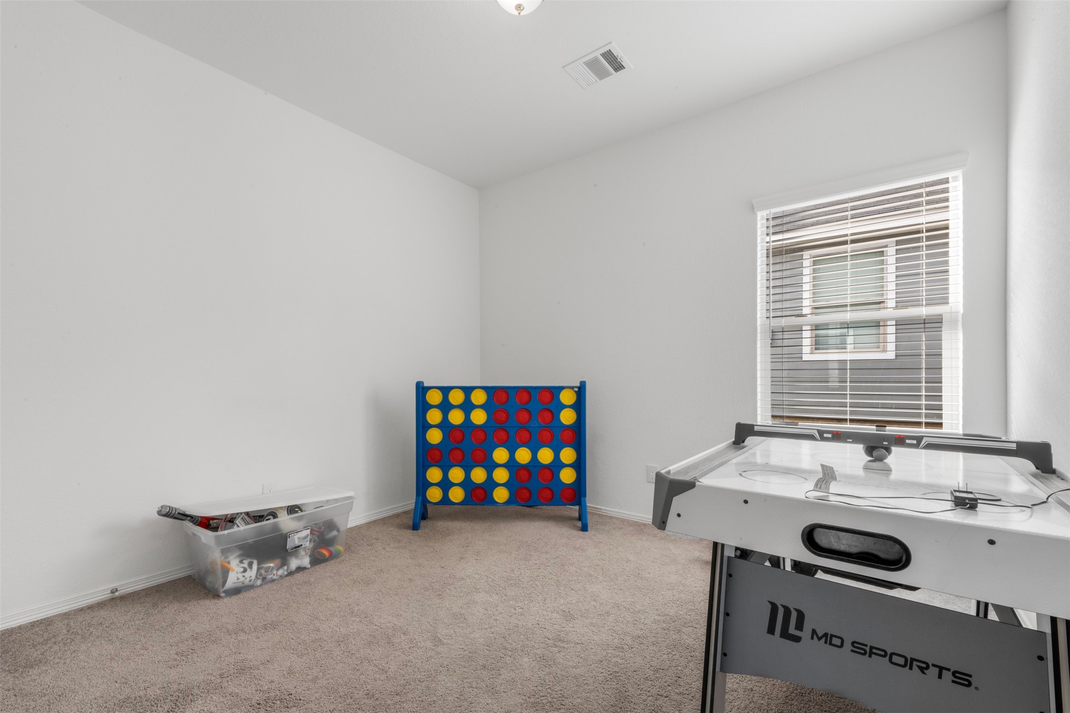 21214 George Vancouver Court Porter, TX 77365 - Photo 19 of 33 a room with furniture and window