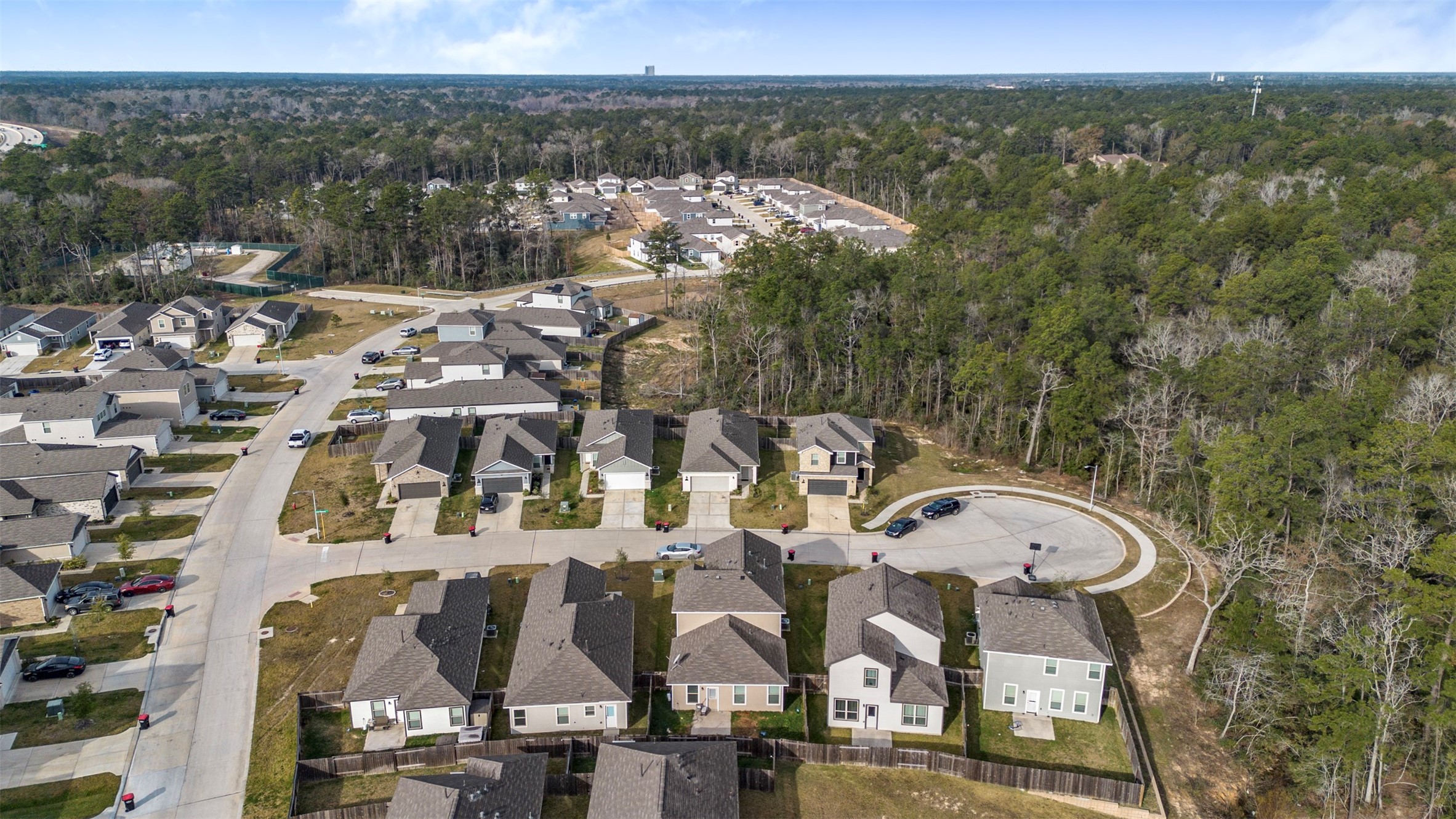 21214 George Vancouver Court Porter, TX 77365 - Photo 22 of 33 a view of a city with lots of residential buildings