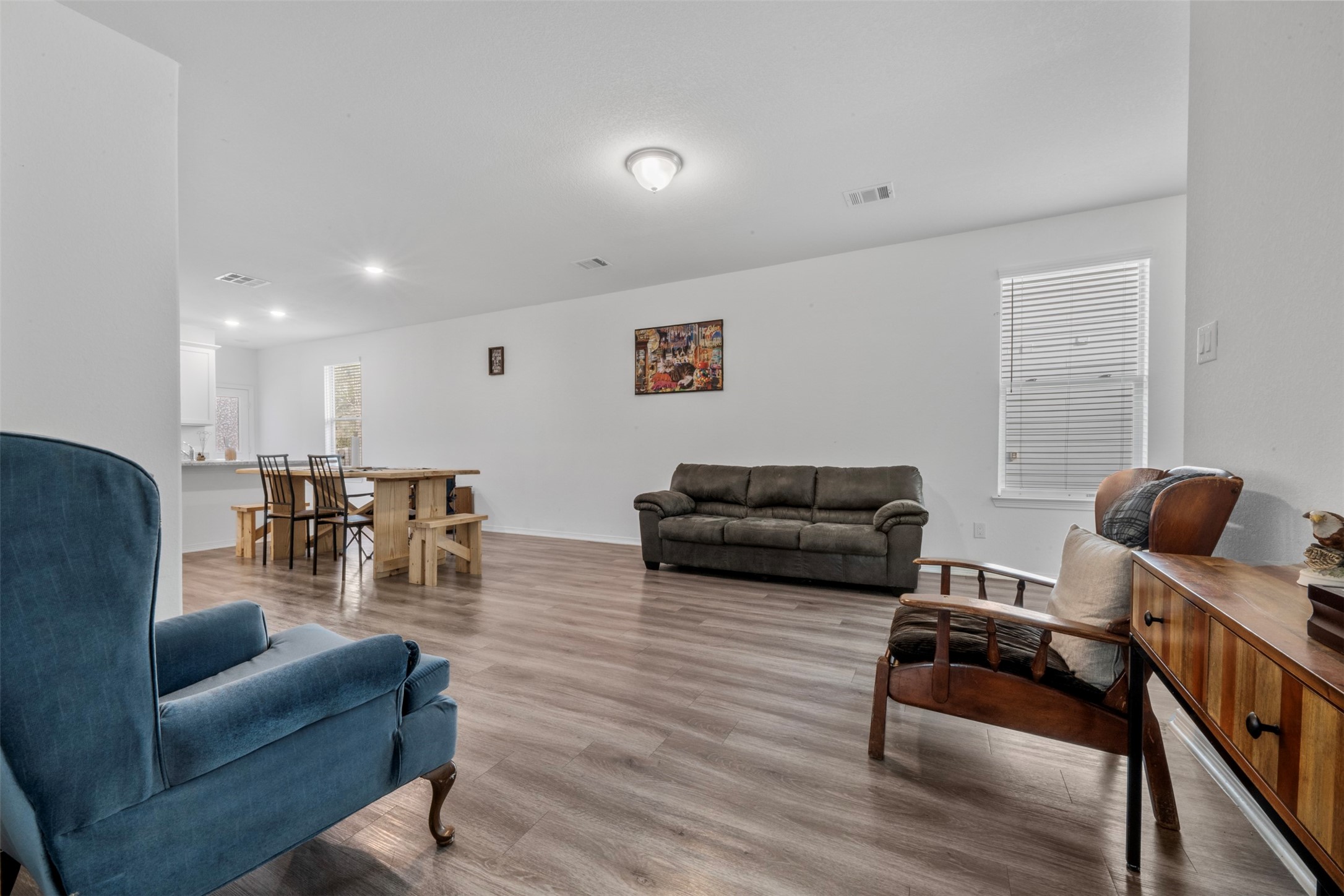 21214 George Vancouver Court Porter, TX 77365 - Photo 8 of 33 a living room with furniture and a flat screen tv