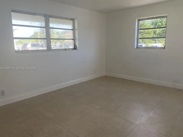 an empty room with a window