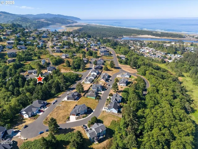an aerial view of residential house with outdoor space