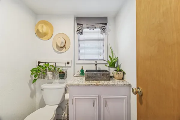 a bathroom with a toilet and a sink