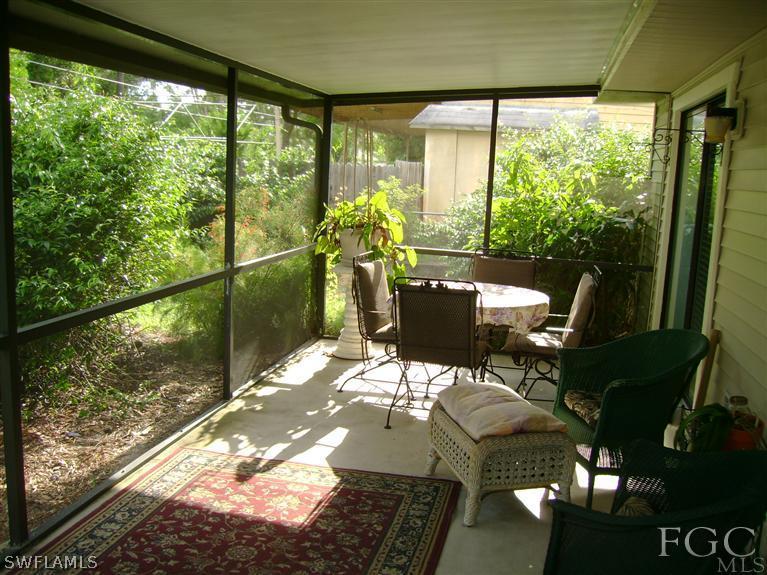 8370 Bamboo Road Fort Myers, FL 33967 - Photo 10 of 15 a view of a porch with chairs and backyard