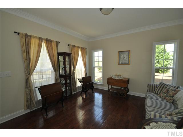 2109 Wide River Drive Raleigh, NC 27614 - Photo 2 of 20 a living room with furniture and a window
