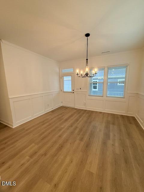 108 Swain Street Clayton, NC 27520 - Photo 11 of 19 a view of a room with window and chandelier