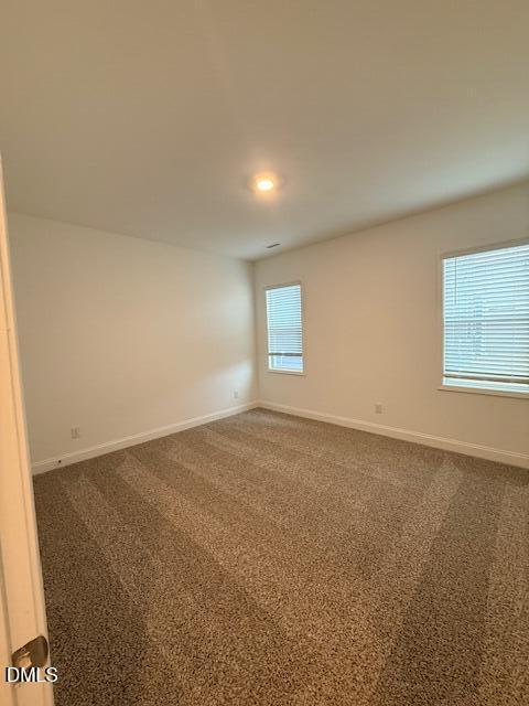 108 Swain Street Clayton, NC 27520 - Photo 12 of 19 en empty room with windows