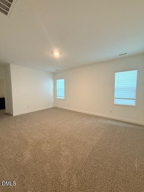 108 Swain Street Clayton, NC 27520 - Photo 16 of 19 an empty room with windows