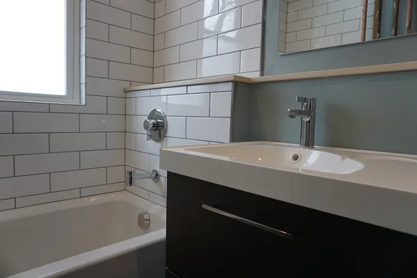 a bathroom with a sink and a bathtub