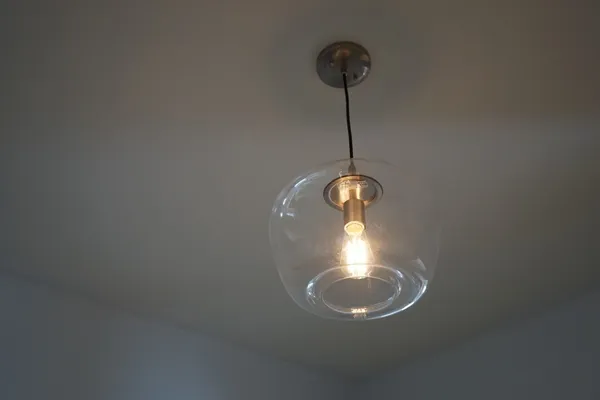 a view of a chandelier in room