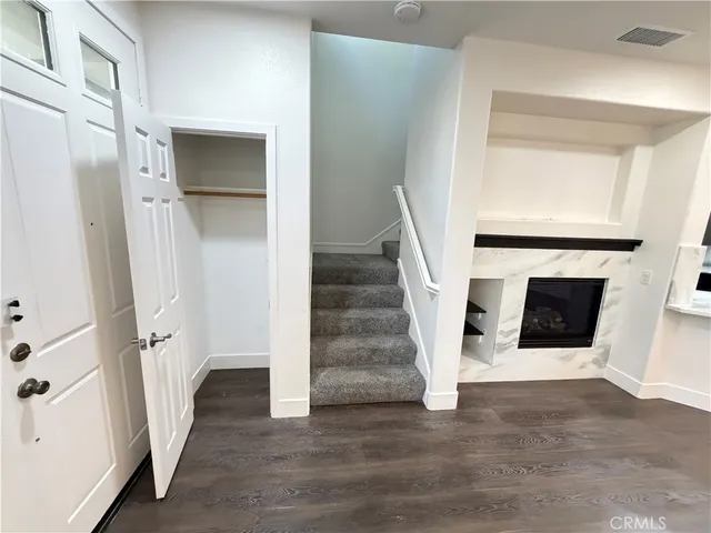 a view of a hallway with staircase