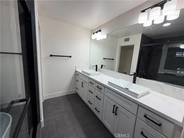 a white toilet sitting in a bathroom