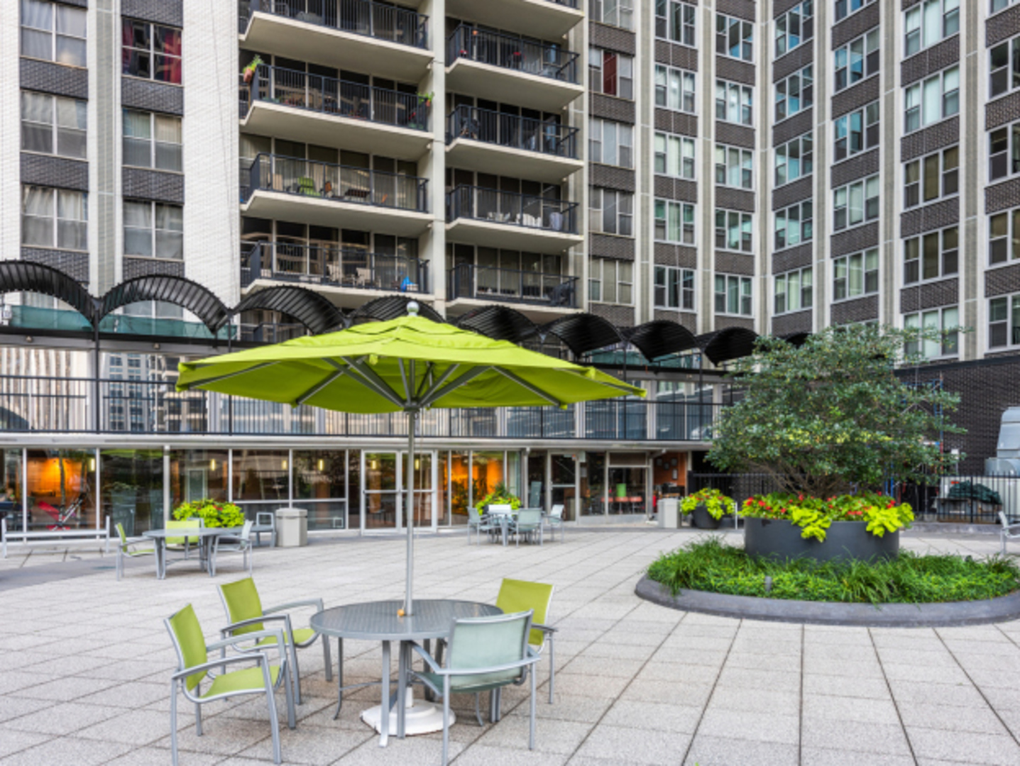 400 East Randolph Street, Unit 706 Chicago, IL 60601 - Photo 15 of 21 a view of a building with a swimming pool and sitting area