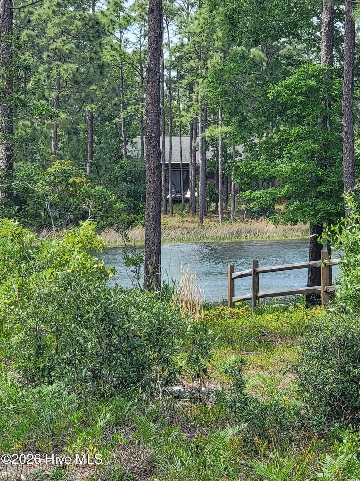 1053 Springdale Road Southport, NC 28461 - Photo 31 of 32 View to one of the lakes