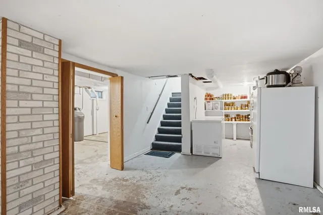 a view of a livingroom with a staircase