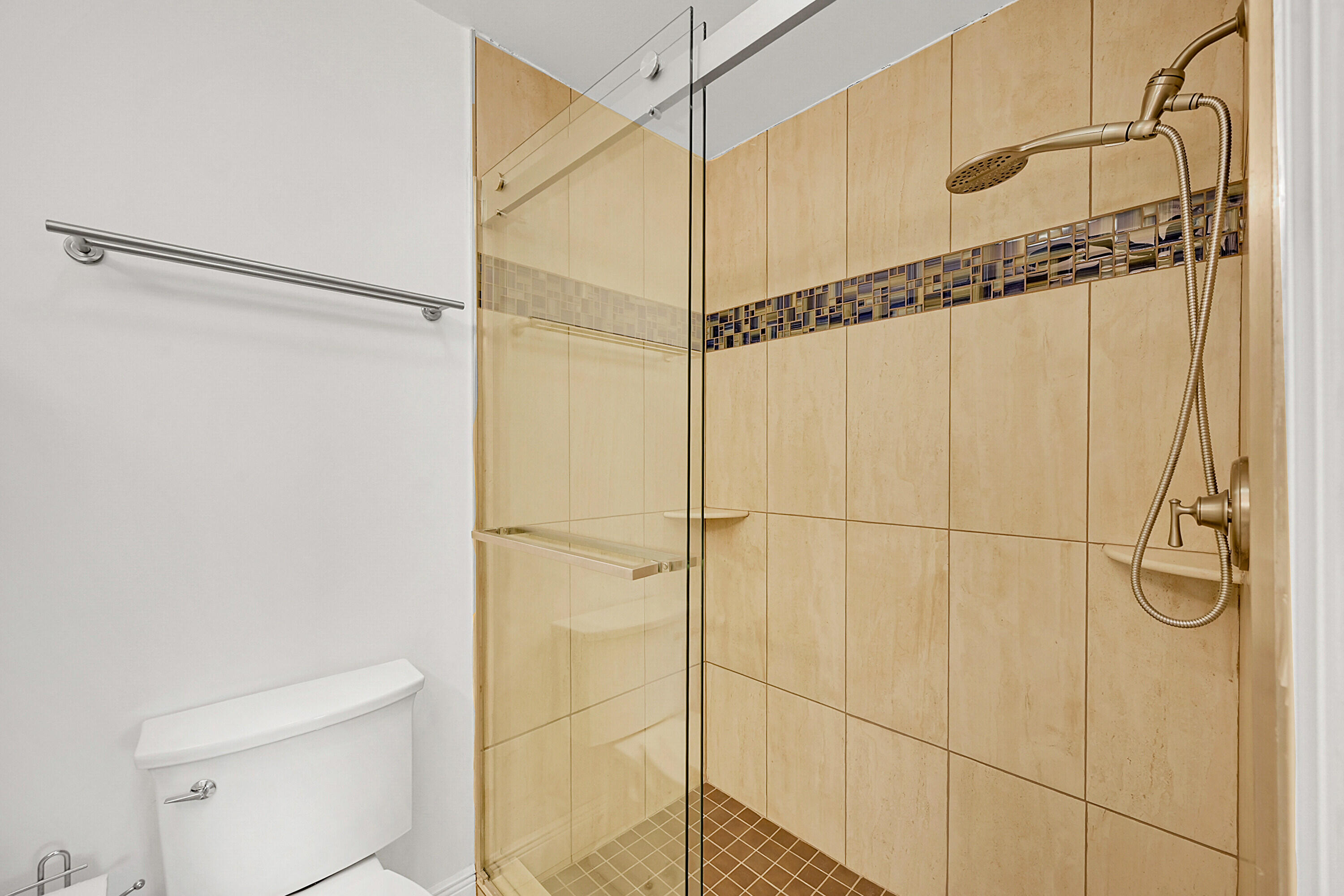 4585 Northwest 3rd Street, Unit D Delray Beach, FL 33445 - Photo 29 of 45 a bathroom with a shower