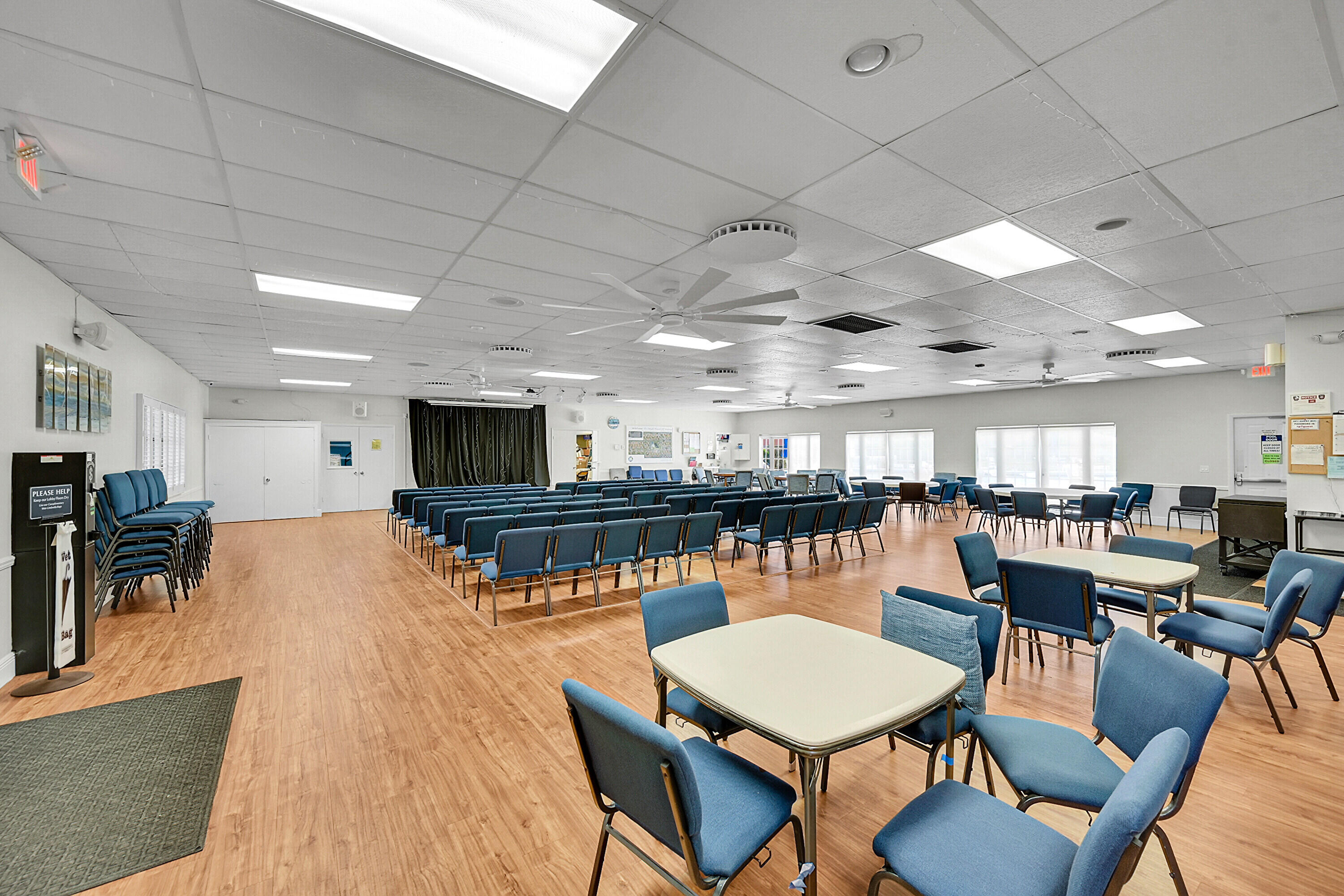 4585 Northwest 3rd Street, Unit D Delray Beach, FL 33445 - Photo 39 of 45 a room with lots of furniture and a table