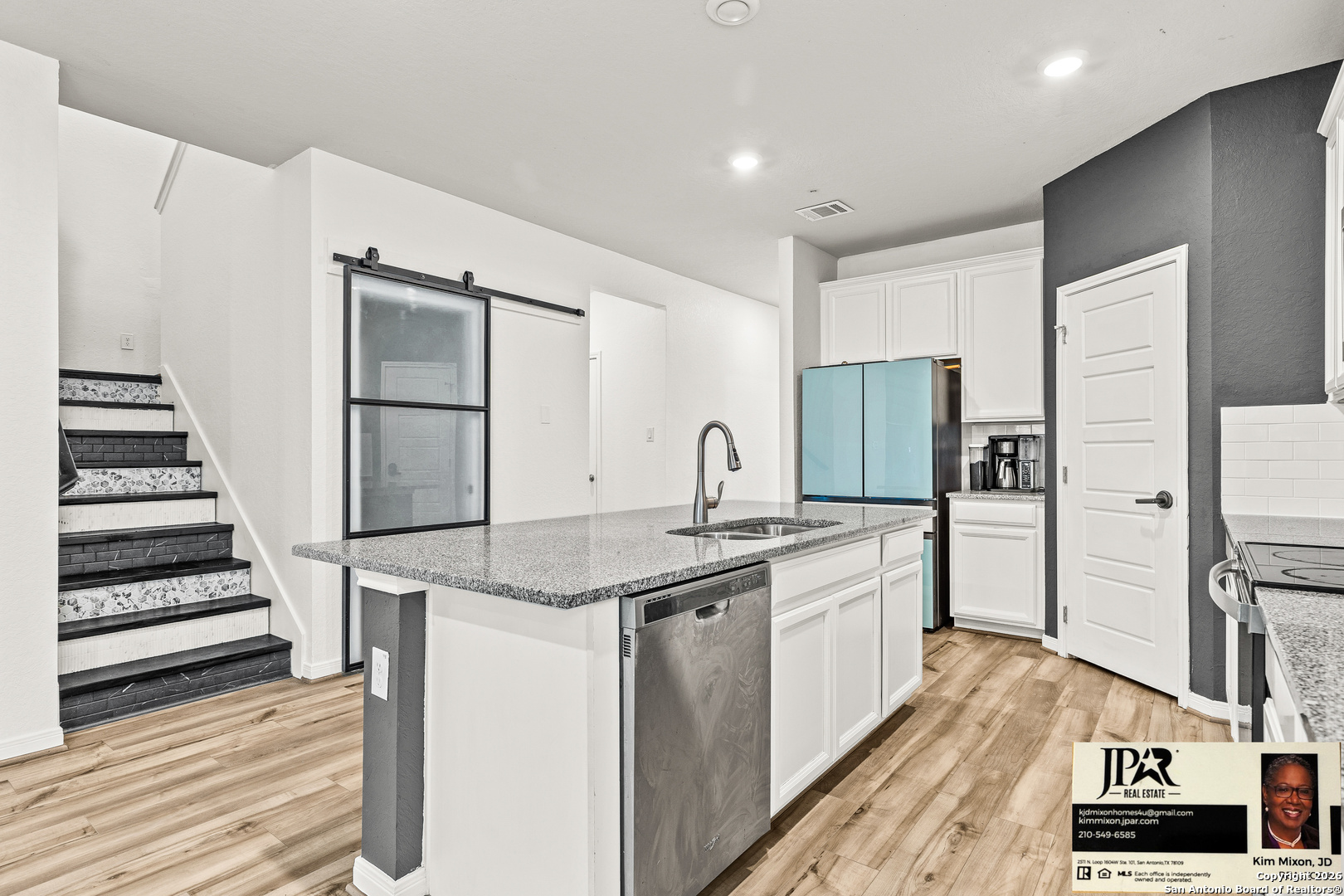 3306 Junction Bay Converse, TX 78109 - Photo 2 of 23 a kitchen with stainless steel appliances a stove refrigerator and cabinets