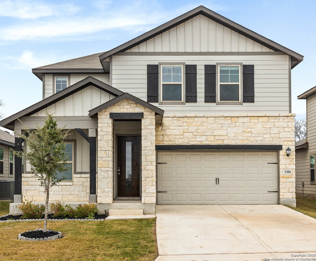 3306 Junction Bay Converse, TX 78109 - Photo 5 of 23 a view of a white house with large windows