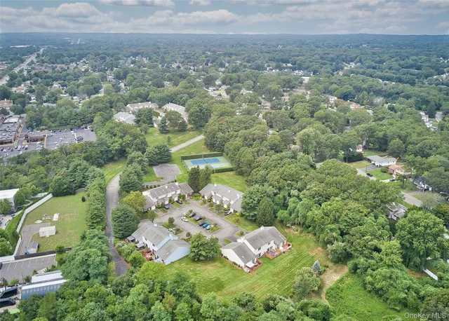 an aerial view of residential house with outdoor space