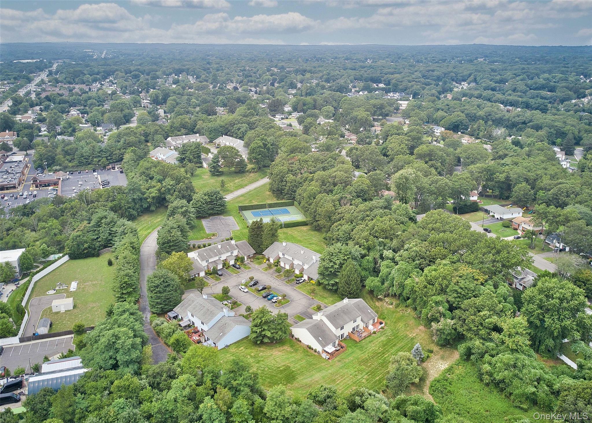 an aerial view of residential house with outdoor space