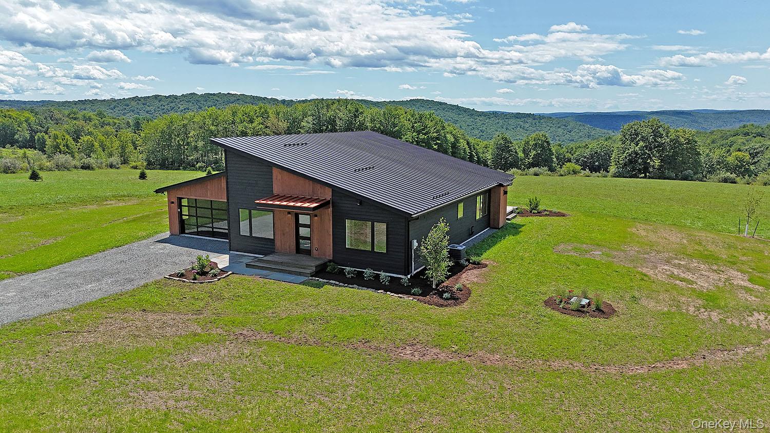 199 Henderson Road Hankins, NY 12741 - Photo 1 of 28 199 Henderson Rd. Set on 12+ acres with tremendous long-range views!