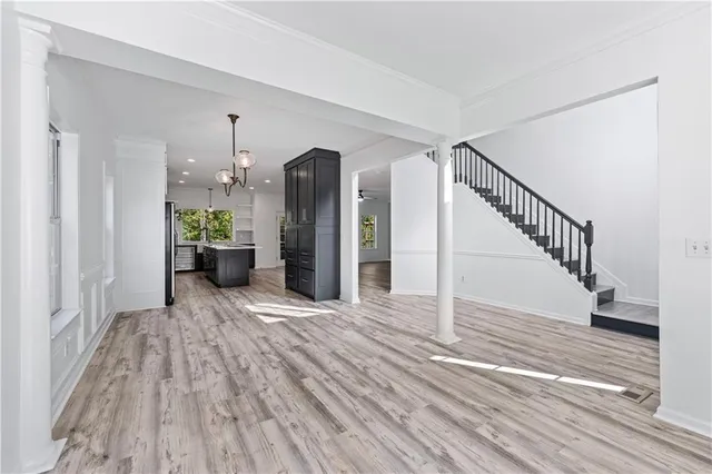 a view of entryway with wooden floor