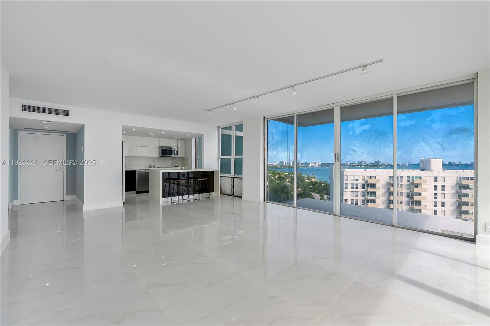 780 Northeast 69th Street, Unit 1601 Miami, FL 33138 - Photo 15 of 18 a view of an empty room with a window