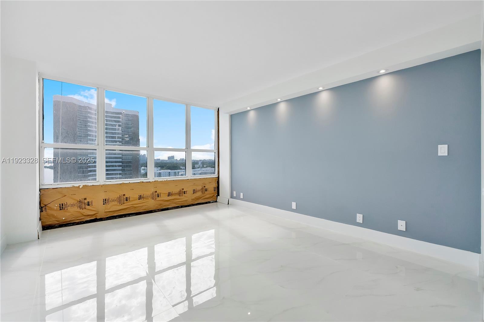 780 Northeast 69th Street, Unit 1601 Miami, FL 33138 - Photo 18 of 18 a view of an empty room with a window