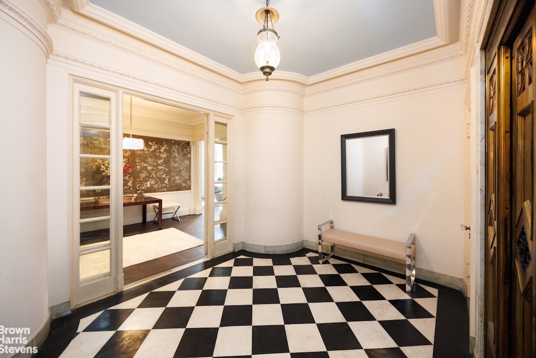 32 East 64th Street, Unit 2E Manhattan, NY 10065 - Photo 3 of 9 a black and white checkered floor with a black white checkered floor