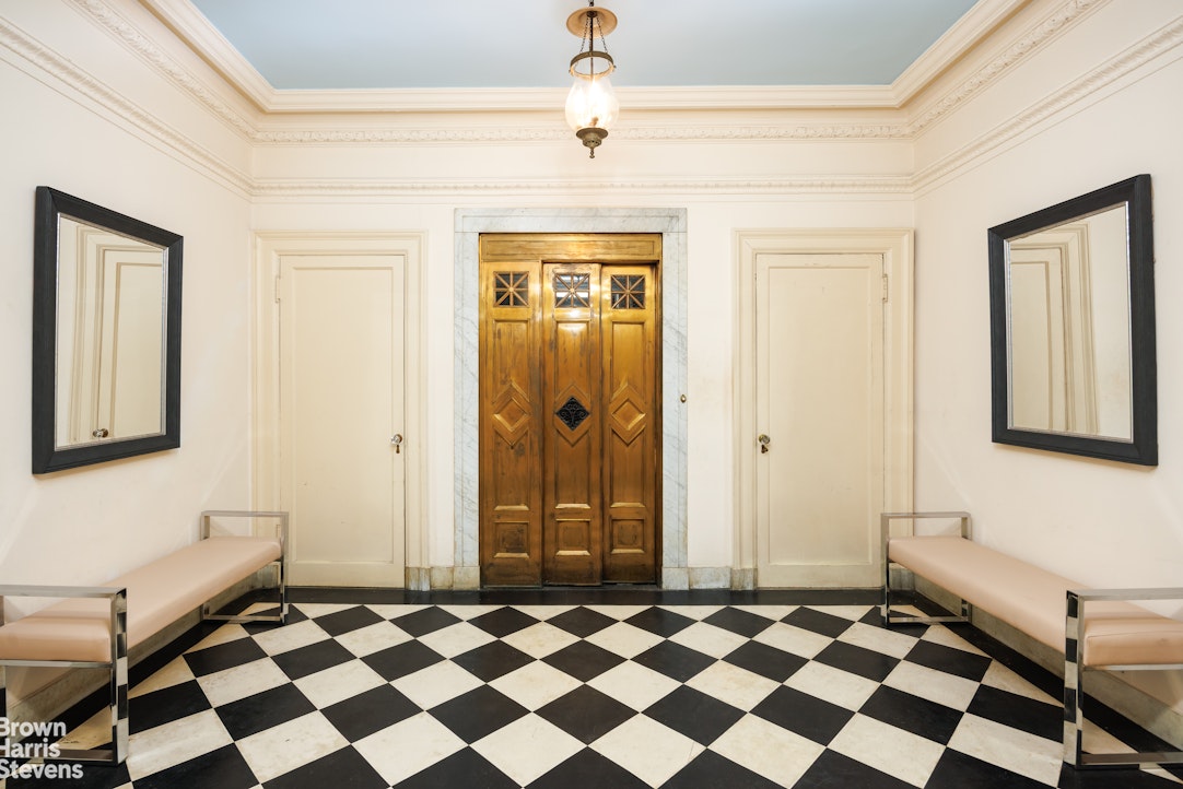 32 East 64th Street, Unit 2E Manhattan, NY 10065 - Photo 4 of 9 a black and white checkered floor