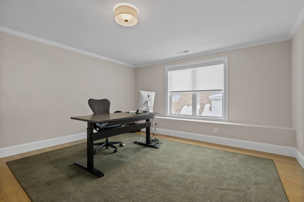 46 Murray Hill Road Boston, MA 02131 - Photo 14 of 25 a view of a workspace with a window