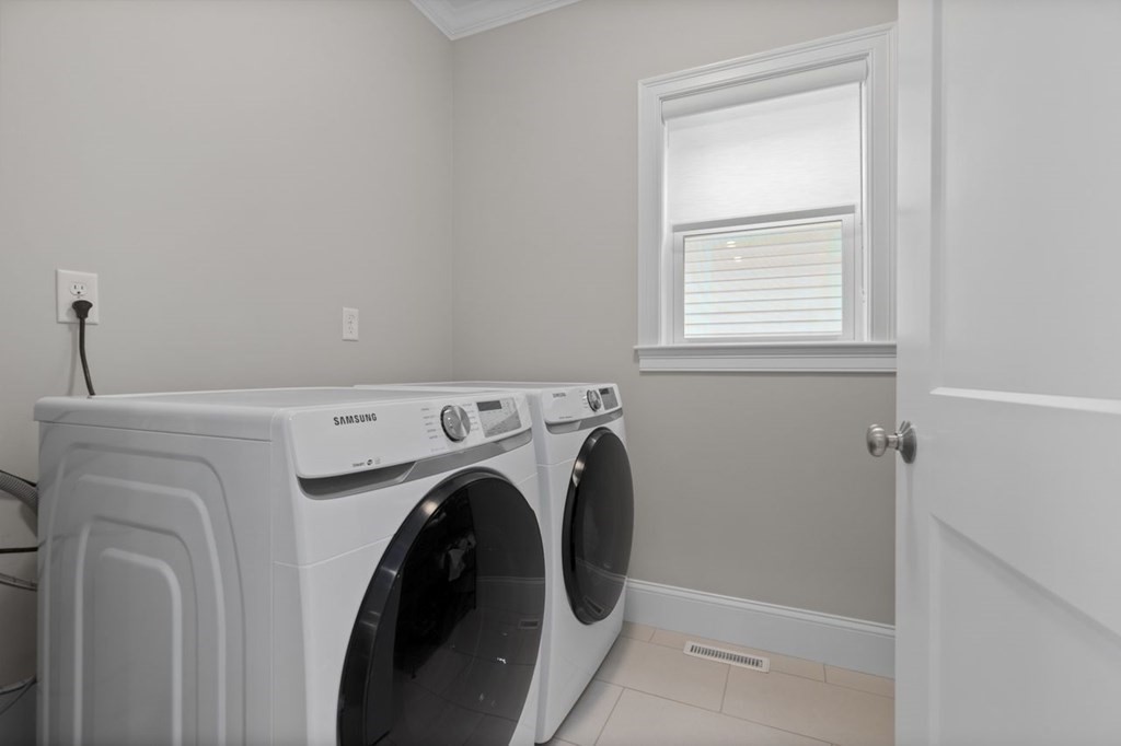 46 Murray Hill Road Boston, MA 02131 - Photo 15 of 25 a utility room with dryer and washer
